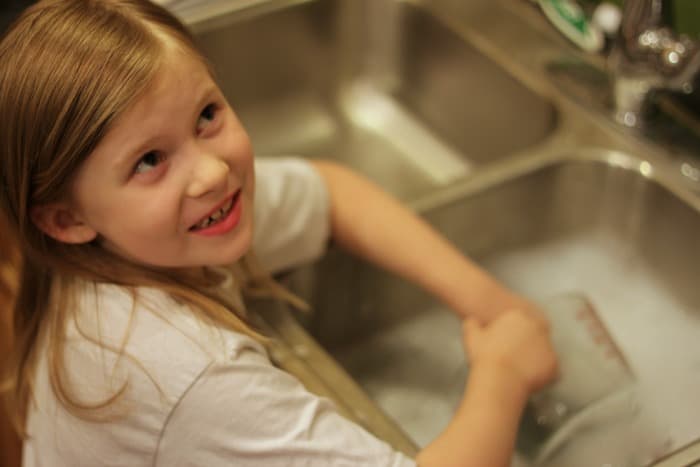 Lizzie washing dishes