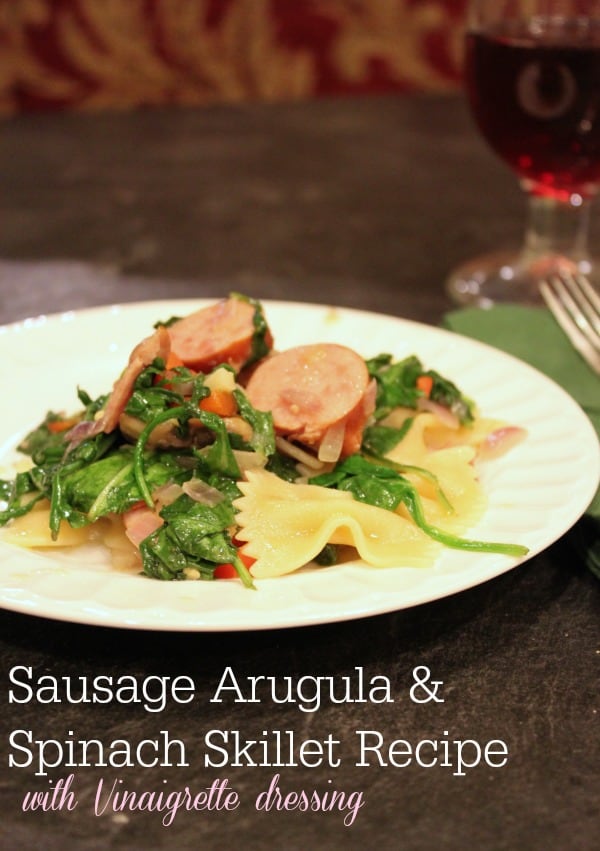 Lite, healthy meal with sausage, arugula, spinach and pasta. 