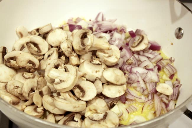 mushrooms and onions in skillet