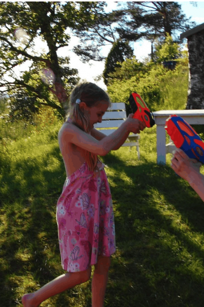 kids playing with water guns