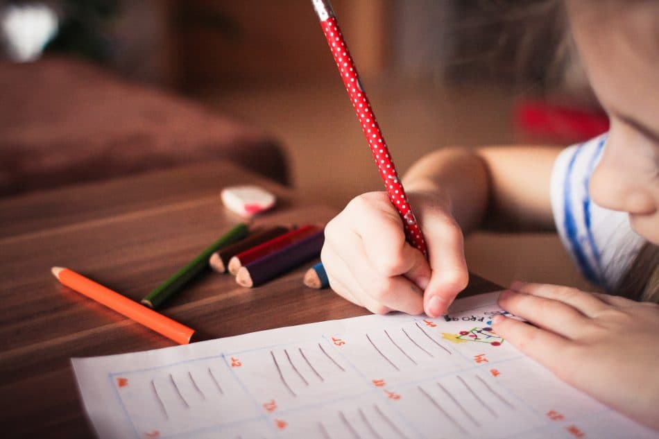 Child doing schoolwork at home
