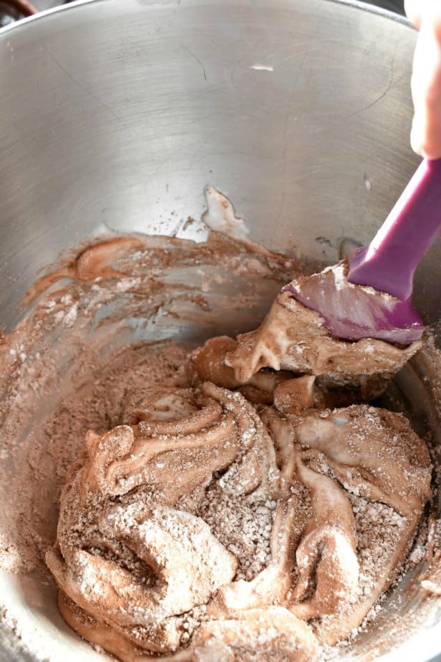 Folding chocolate macaron dough