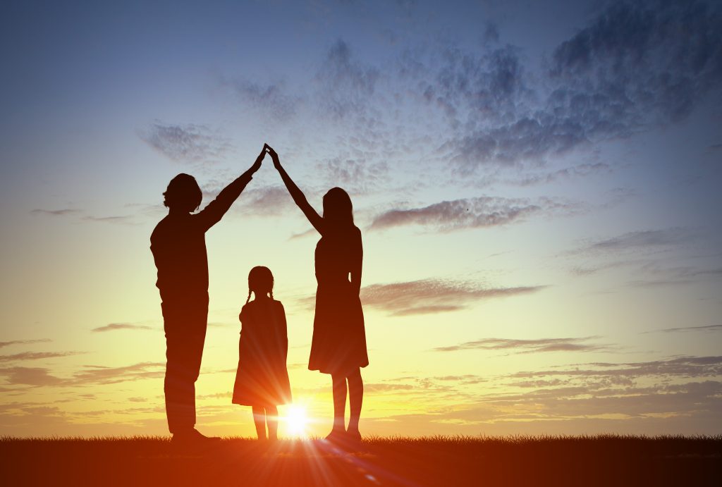 A husband, wife, and a child