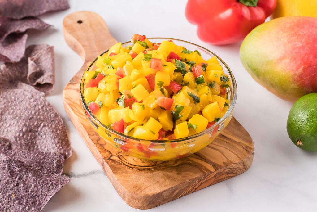 A bowl of mango salsa 