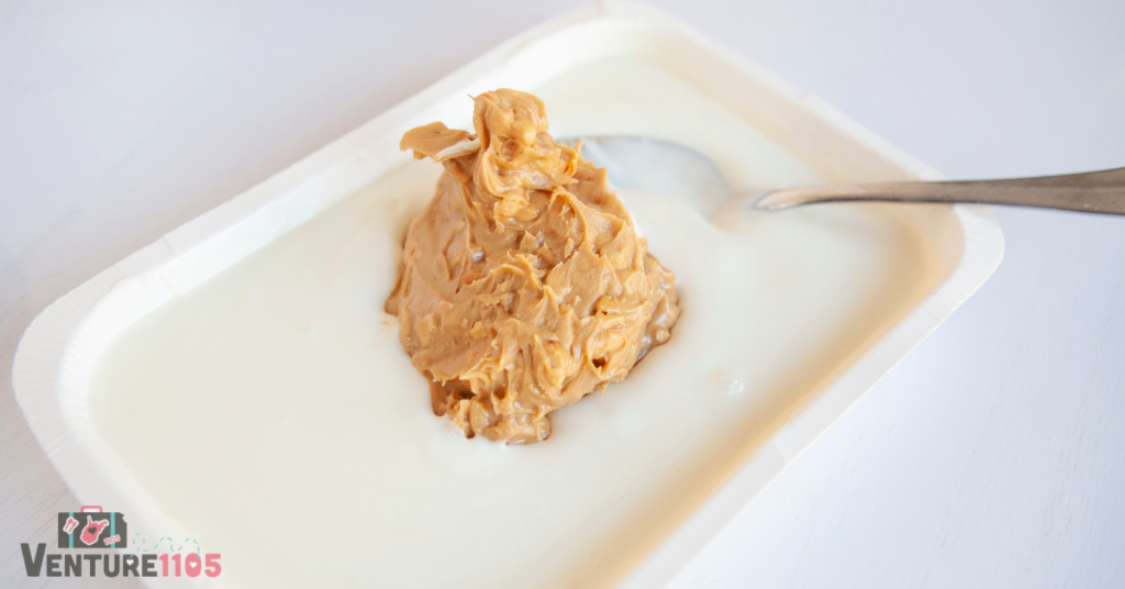 Mixing peanut butter into the melted almond bark