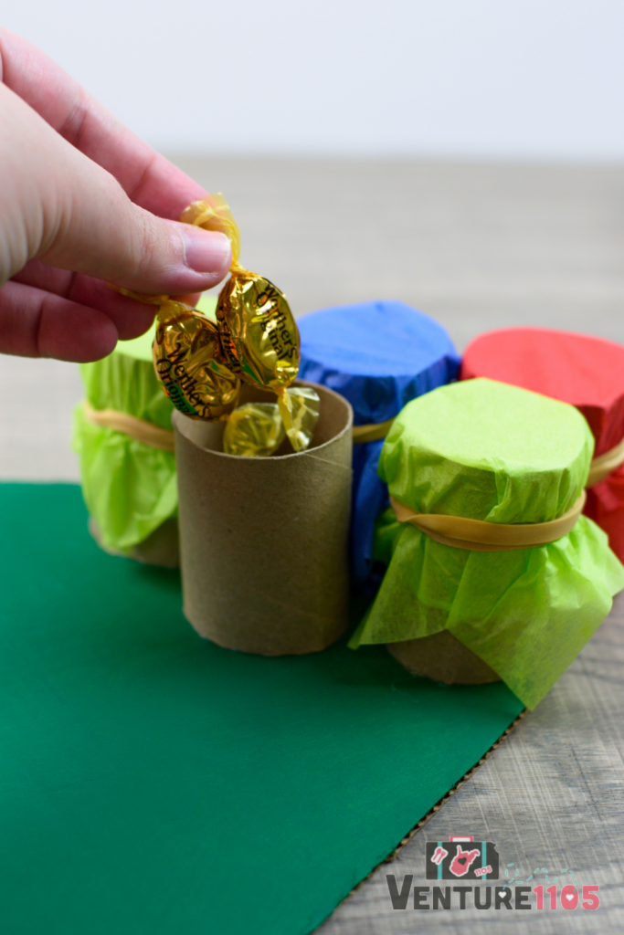 Adding candy to the toilet paper roll advent calendar
