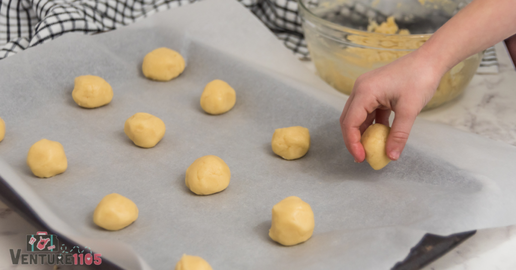 Dropping the cookies onto the baking sheet 