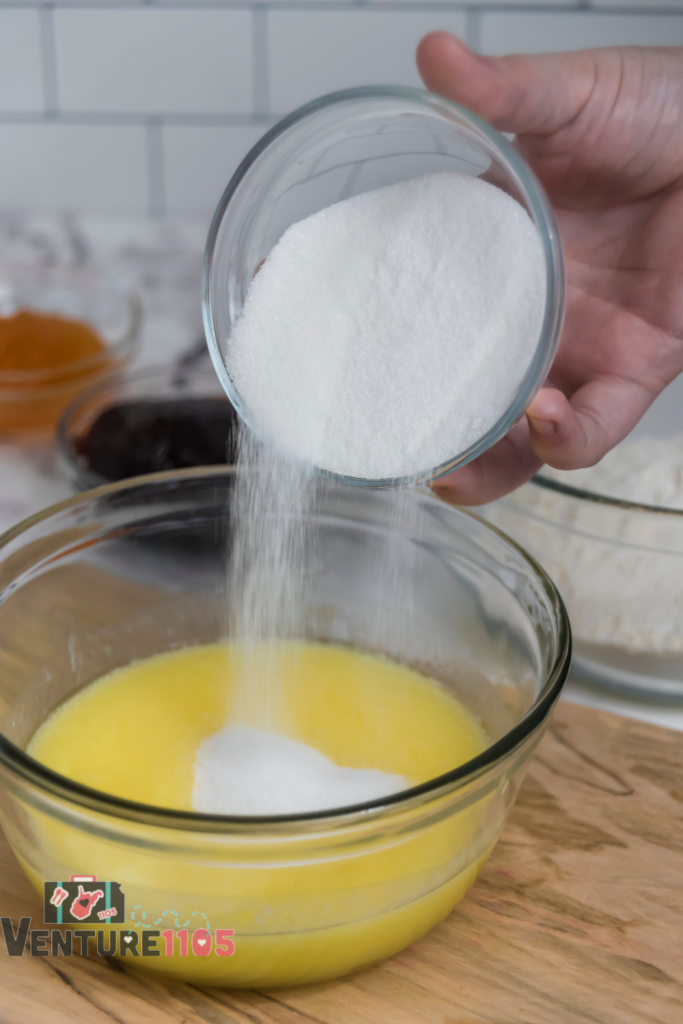 Adding sugar to the melted butter 