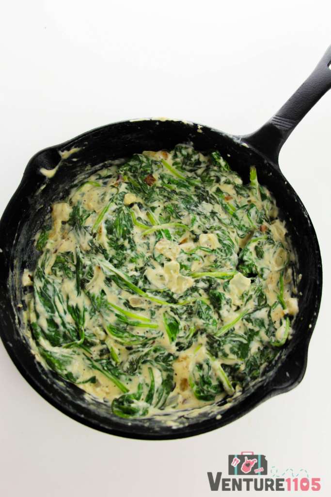 Creamed spinach in a cast iron skillet