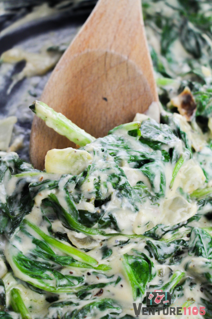 Mixing the spinach dish 