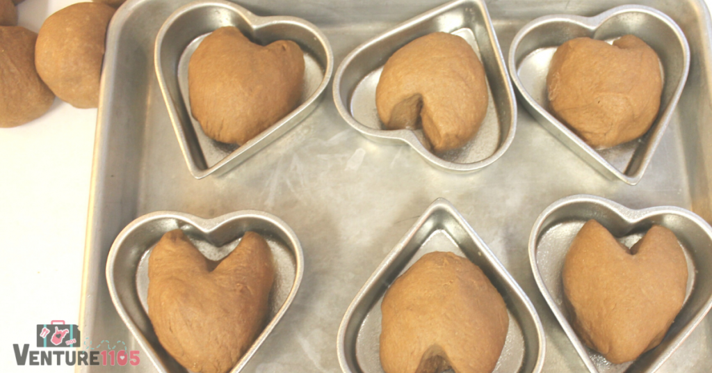 Chocolate sweet rolls in heart-shaped tins 