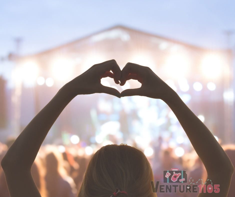 heart hands at a concert 