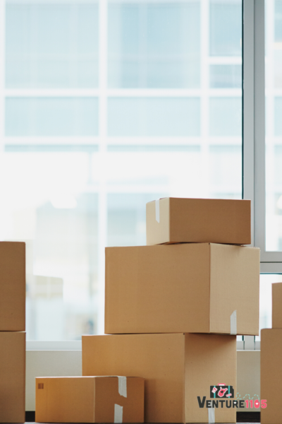 moving boxes in front of a window