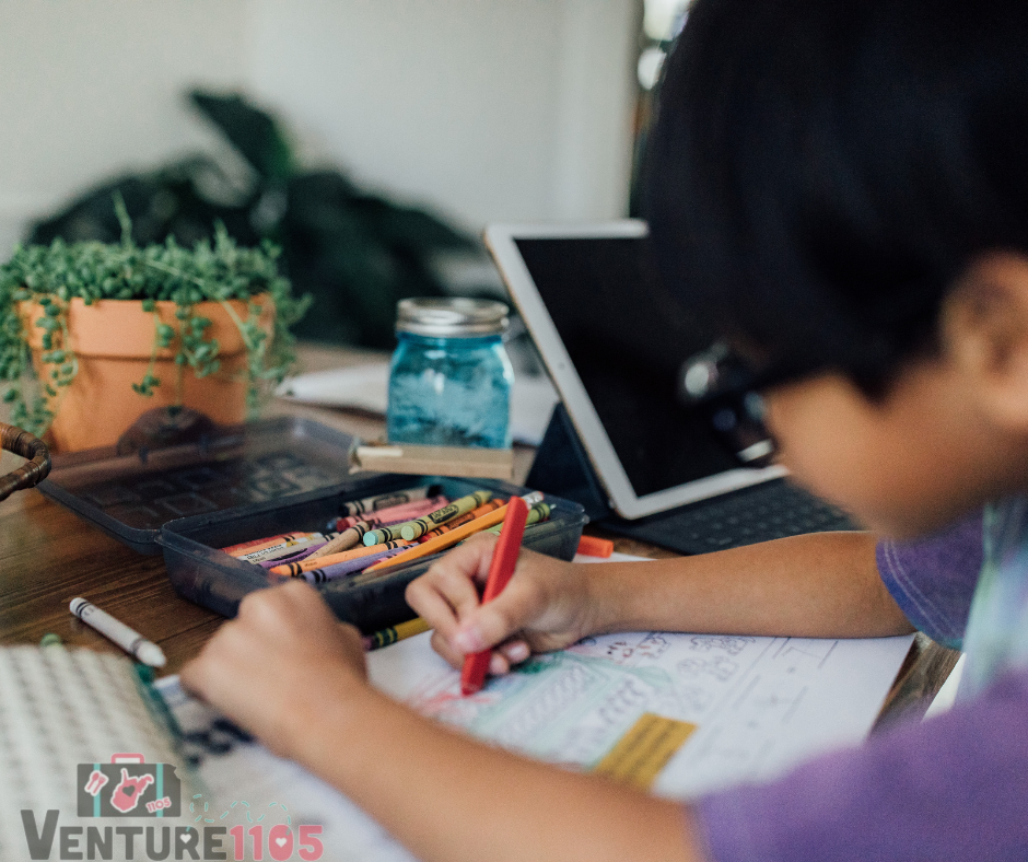 A child coloring during learning from home