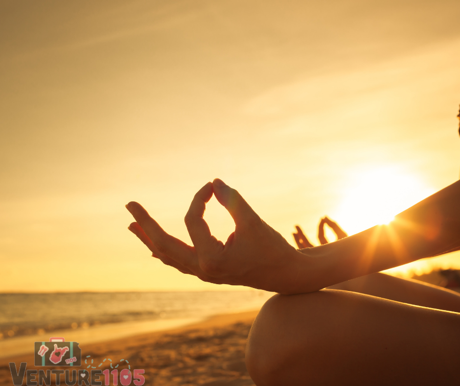 Meditating on the beach at sunrise