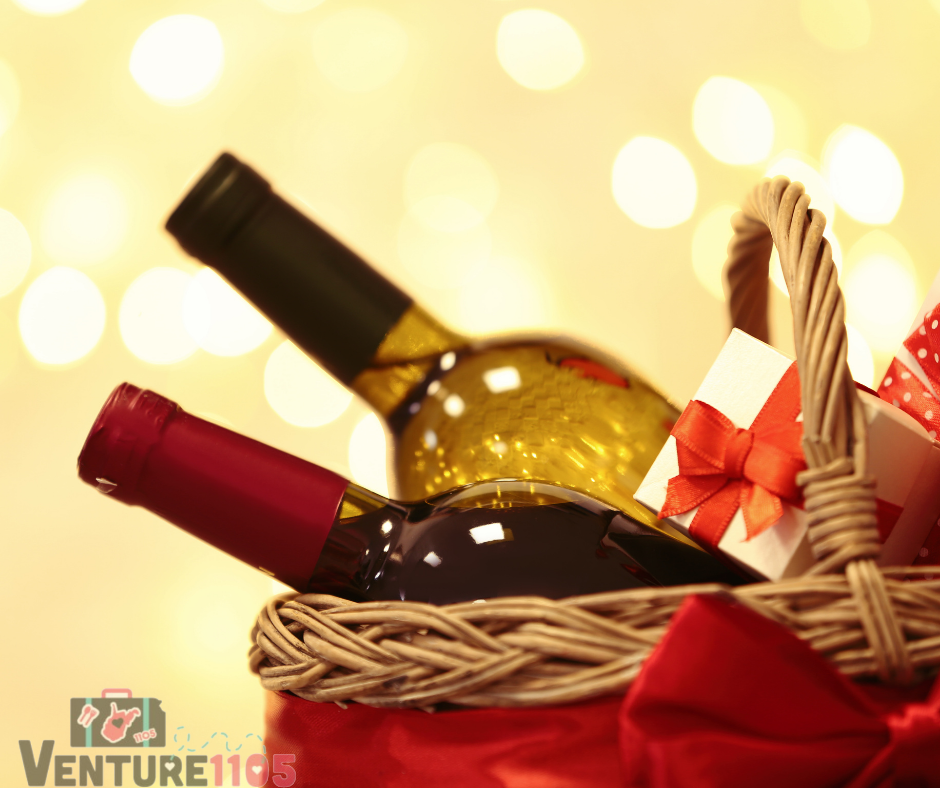 a gift basket filled with wine bottles 