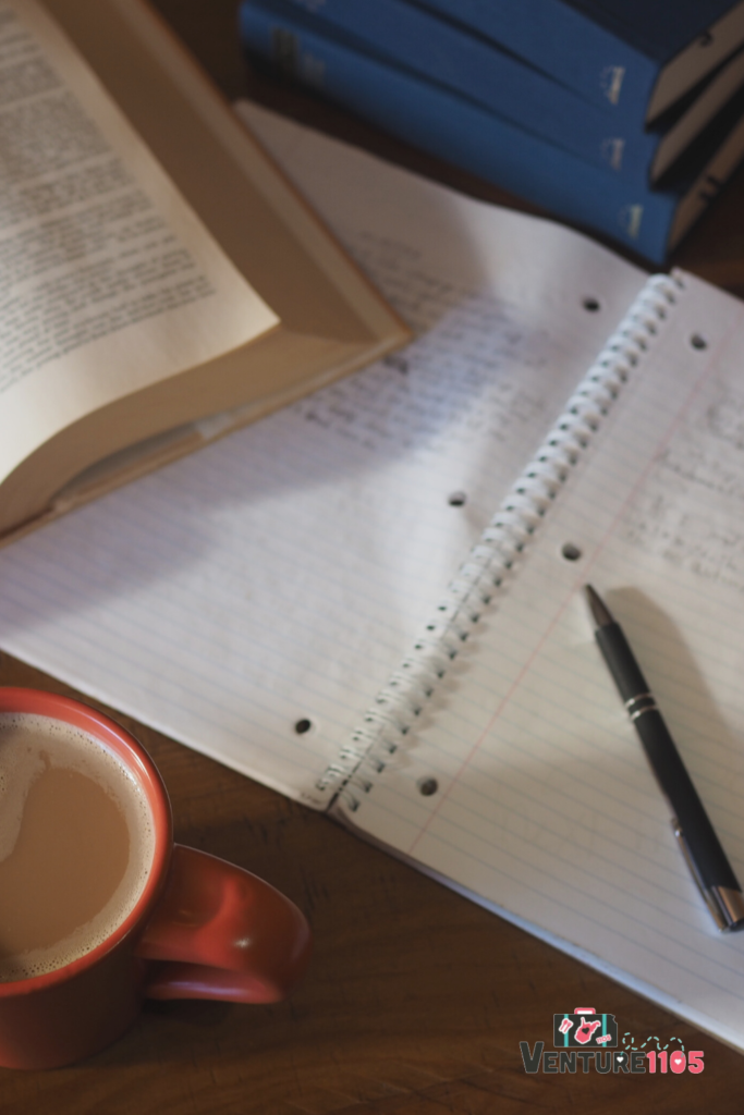 a stack of books and paper