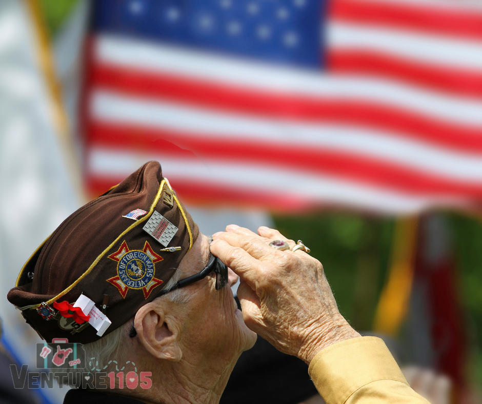 a veteran saluting the flag