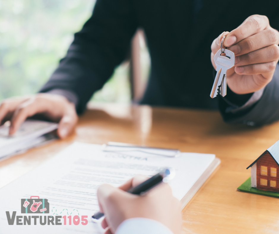 a landlord and tenant signing paperwork 