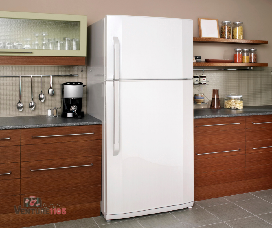 A white single door refrigerator in a kitchen
