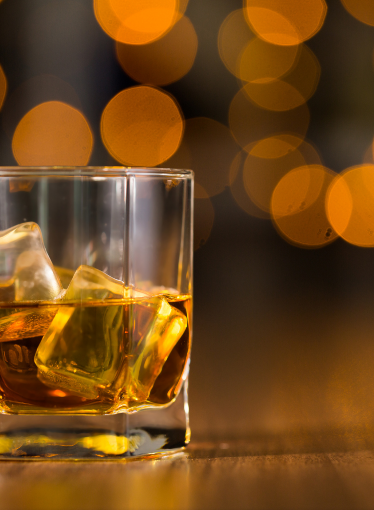 A glass with ice and whiskey