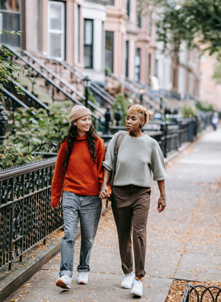 Two women holding hands in Georgetown Washington DC 